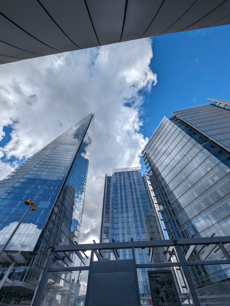 a group of tall buildings sitting next to each other