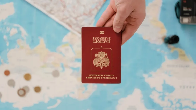 Traveler reviewing official foreign travel advice on a laptop before booking a flight