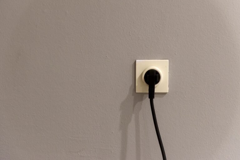 Plug being switched off at the wall