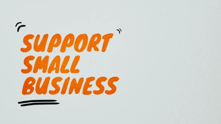 Small business owner managing digital marketing strategy and operational processes on laptop