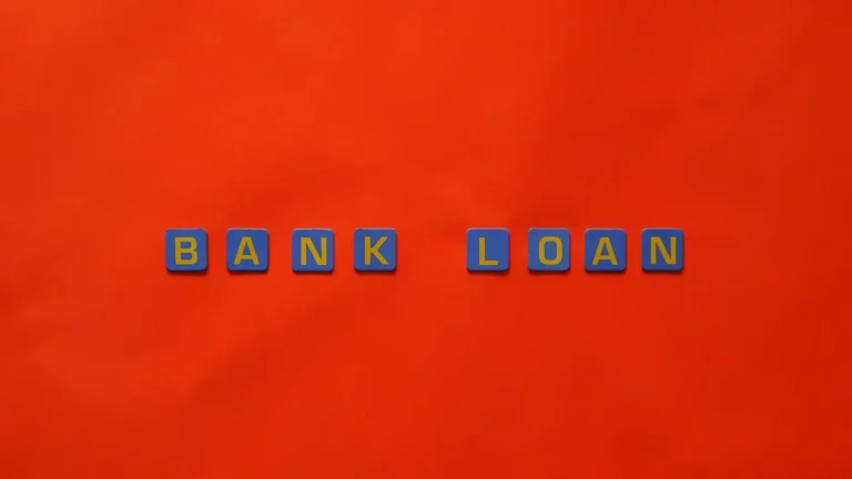 UK small business owner reviewing alternative lending options on computer